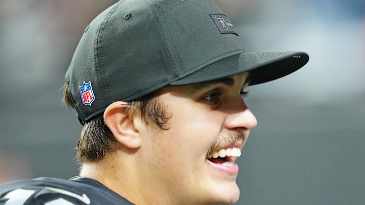 Jan 4, 2026; Paradise, Nevada, USA; Las Vegas Raiders quarterback Aidan O'Connell (12) walks off the field after the Raiders defeated the Kansas City Chiefs 14-12 at Allegiant Stadium. Mandatory Credit: Stephen R. Sylvanie-Imagn Images