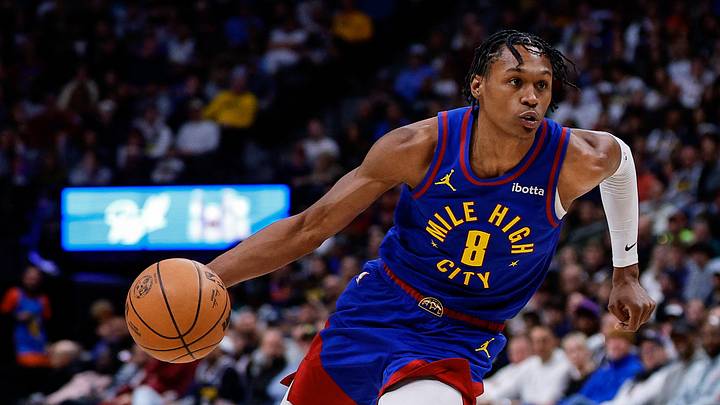 Feb 1, 2026; Denver, Colorado, USA; Denver Nuggets guard Peyton Watson (8) controls the ball in the third quarter against the Oklahoma City Thunder at Ball Arena. Mandatory Credit: Isaiah J. Downing-Imagn Images