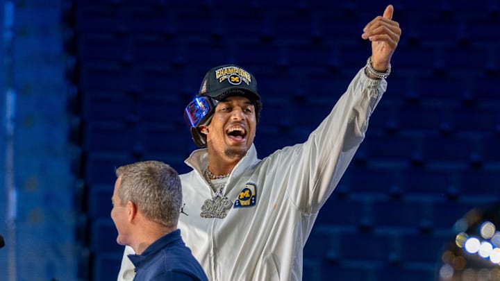 Michigan Wolverines player Yaxel Lendeborg stands next to head coach Dusty May during a celebration honoring the team’s NCAA men’s basketball national championship at Crisler Center in Ann Arbor on Saturday, April 11, 2026.