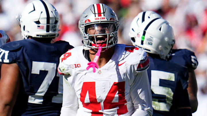 Ohio State Buckeyes defensive end JT Tuimoloau (44) celebrates a sack of Penn State Nittany Lions quarterback Drew Allar (15) during the second half of the NCAA football game at Beaver Stadium in University Park, Pa. on Saturday, Nov. 2, 2024. Ohio State won 20-13.