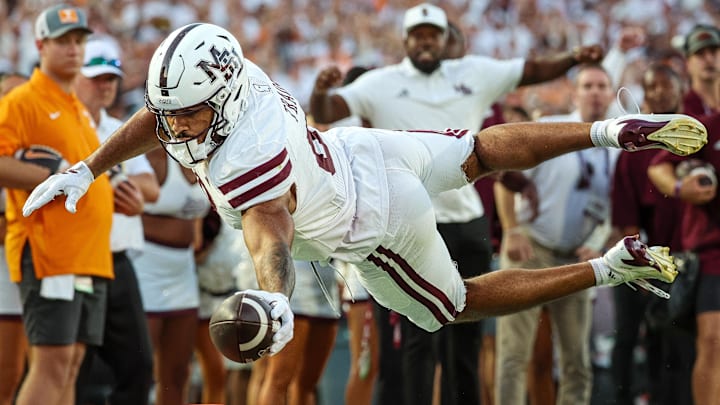 Mississippi State Bulldogs tight end Seydou Traore (8) dives for a touchdown against the Tennessee Volunteers during the second half at Davis Wade Stadium at Scott Field. Mississippi State Bulldogs tight end Seydou Traore (8) dives for a touchdown against the Tennessee Volunteers during the second half at Davis Wade Stadium at Scott Field.