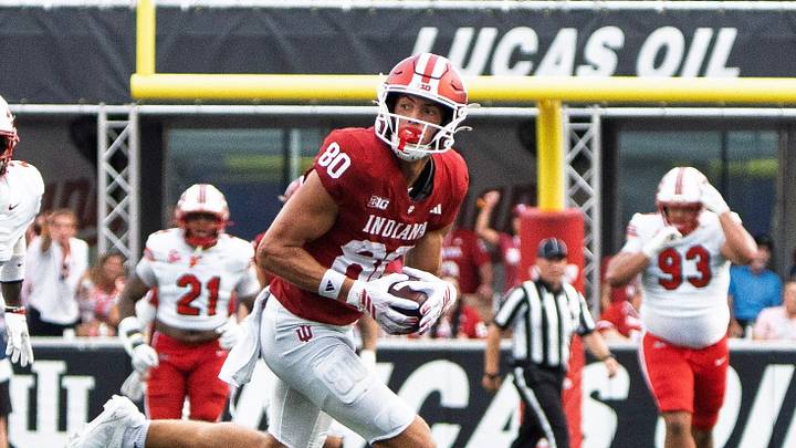 Indiana's Charlie Becker (80) runs for a touchdown during the Indiana versus Western Kentucky football game at Memorial Stadium on Saturday, Sept. 19, 2026. Indiana's Charlie Becker (80) runs for a touchdown during the Indiana versus Western Kentucky football game at Memorial Stadium on Saturday, Sept. 19, 2026.