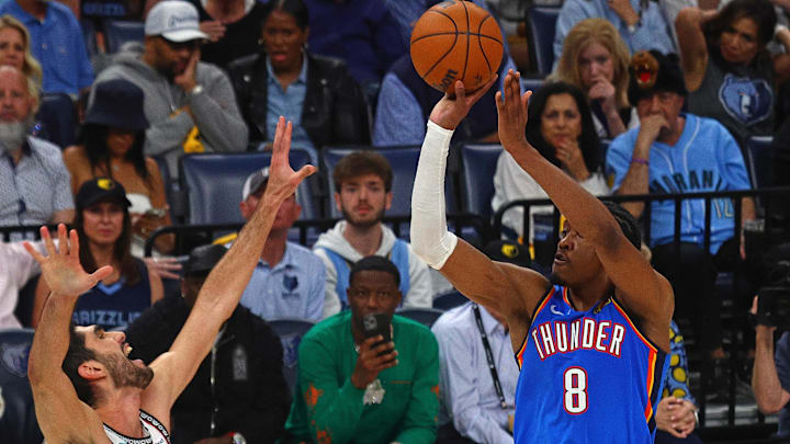 Apr 24, 2025; Memphis, Tennessee, USA; Oklahoma City Thunder forward Jalen Williams (8) shoots as Memphis Grizzlies forward Santi Aldama (7) defends during the third quarter during game three for the first round of the 2024 NBA Playoffs at FedExForum. Mandatory Credit: Petre Thomas-Imagn Images