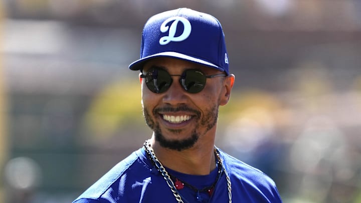Los Angeles Dodgers shortstop Mookie Betts warms up for a Spring Training game.