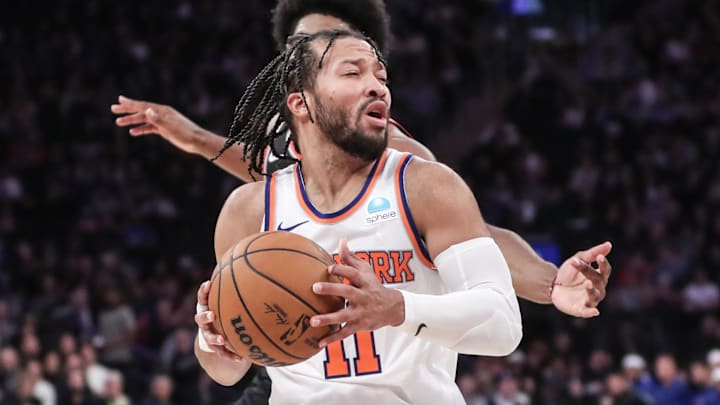 New York Knicks guard Jalen Brunson spins away from Portland Trail Blazers guard Scoot Henderson. New York Knicks guard Jalen Brunson spins away from Portland Trail Blazers guard Scoot Henderson.
