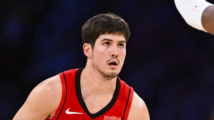 Apr 11, 2025; Los Angeles, California, USA; Houston Rockets guard Reed Sheppard (15) looks to shoot against Los Angeles Lakers forward Rui Hachimura (28) during the second half at Crypto.com Arena. Mandatory Credit: Jonathan Hui-Imagn Images