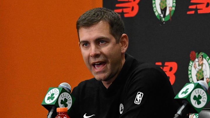 Sep 25, 2025; Boston, MA, USA; Boston Celtics president of basketball operations Brad Stevens speaks during a press conference as co-owner and alternate governor Aditya Mittalat (black) and lead owner and governor Bill Chisholm (white) look on at Auerbach Center. Mandatory Credit: Eric Canha-Imagn Images Sep 25, 2025; Boston, MA, USA; Boston Celtics president of basketball operations Brad Stevens speaks during a press conference as co-owner and alternate governor Aditya Mittalat (black) and lead owner and governor Bill Chisholm (white) look on at Auerbach Center. Mandatory Credit: Eric Canha-Imagn Images