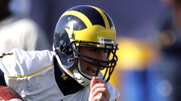 Michigan quarterback Nick Sheridan scrambles out of the pocket during spring practice March 14, 2009.