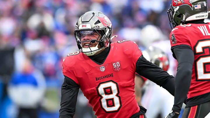 Nov 16, 2025; Orchard Park, New York, USA; Tampa Bay Buccaneers linebacker SirVocea Dennis (8) reacts to making an interception against the Buffalo Bills in the second quarter at Highmark Stadium. Mandatory Credit: Mark Konezny-Imagn Images