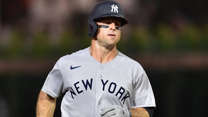 Aug 12, 2021; Dyersville, Iowa, USA; New York Yankees left fielder Brett Gardner (11) runs the bases after hitting a home run against the  Chicago White Sox during the sixth inning at Field of Dreams