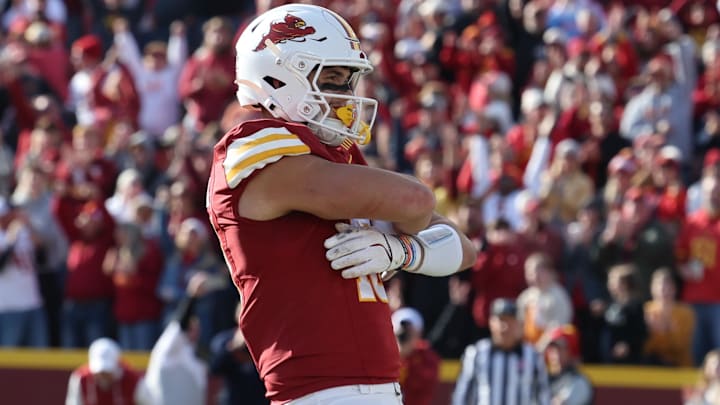 Nov 22, 2025; Ames, Iowa, USA; Iowa State Cyclones tight end Benjamin Brahmer (18) catches a touchdown pass in their game with the Kansas Jayhawks during the second half at Jack Trice Stadium.