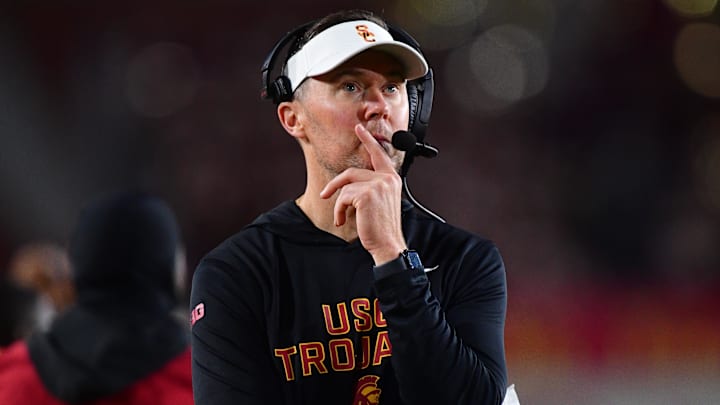 Nov 7, 2025; Los Angeles, California, USA; Southern California Trojans head coach Lincoln Riley watches game action against the Northwestern Wildcats during the second half at the Los Angeles Memorial Coliseum. Mandatory Credit: Gary A. Vasquez-Imagn Images