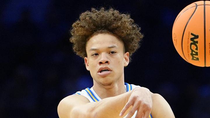Mar 20, 2026; Philadelphia, PA, USA; UCLA Bruins guard Trent Perry (0) makes a pass against the UCF Knights in the first half during a first round game of the men's 2026 NCAA Tournament at Xfinity Mobile Arena. Mandatory Credit: Kyle Ross-Imagn Images Mar 20, 2026; Philadelphia, PA, USA; UCLA Bruins guard Trent Perry (0) makes a pass against the UCF Knights in the first half during a first round game of the men's 2026 NCAA Tournament at Xfinity Mobile Arena. Mandatory Credit: Kyle Ross-Imagn Images