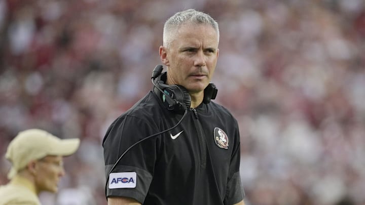 Aug 30, 2025; Tallahassee, Florida, USA; Florida State Seminoles head coach Mike Norvell reacts after a play against the Alabama Crimson Tide during the second half at Doak S. 