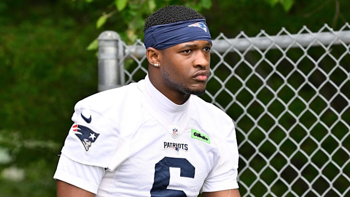 Jun 9, 2025; Foxborough, MA, USA; New England Patriots wide receiver Javon Baker (6) walks to the practice fields at Gillette Stadium. Mandatory Credit: Eric Canha-Imagn Images