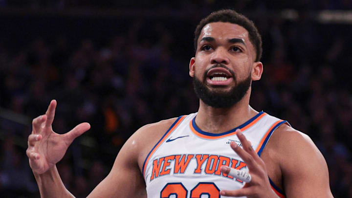 Feb 19, 2026; New York, New York, USA; New York Knicks center Karl-Anthony Towns (32) reacts during the first half against Detroit Pistons at Madison Square Garden. Mandatory Credit: Vincent Carchietta-Imagn Images