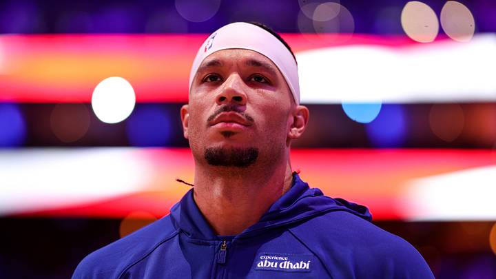 New York Knicks guard Josh Hart stands for the anthem before action against the Philadelphia 76ers at Xfinity Mobile Arena. Mandatory Credit: Bill Streicher-Imagn Images