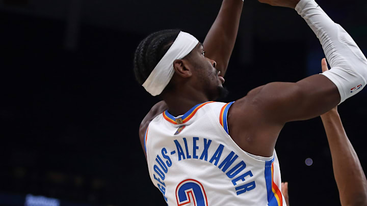 Nov 9, 2025; Memphis, Tennessee, USA; Oklahoma City Thunder guard Shai Gilgeous-Alexander (2) shoots as Memphis Grizzlies forward Jaylen Wells (0) defends during the first quarter at FedExForum. Mandatory Credit: Petre Thomas-Imagn Images