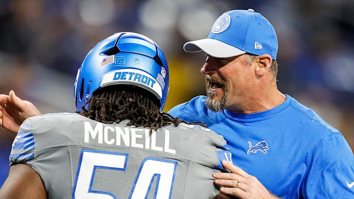 Lions coach Dan Campbell talks to defensive tackle Alim McNeill during warmups before Raiders game at Ford Field Lions coach Dan Campbell talks to defensive tackle Alim McNeill during warmups before Raiders game at Ford Field