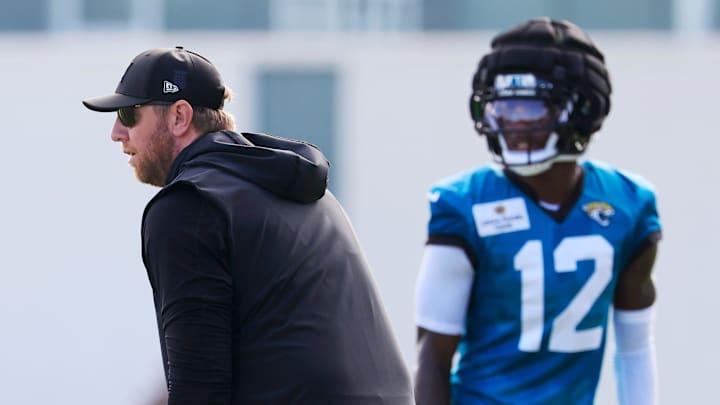 Jacksonville Jaguars head coach Liam Coen lines up against wide receiver Travis Hunter (12) during an NFL training camp session at the Miller Electric Center, Sunday, Aug. 3, 2025, in Jacksonville, Fla. [Corey Perrine/Florida Times-Union]