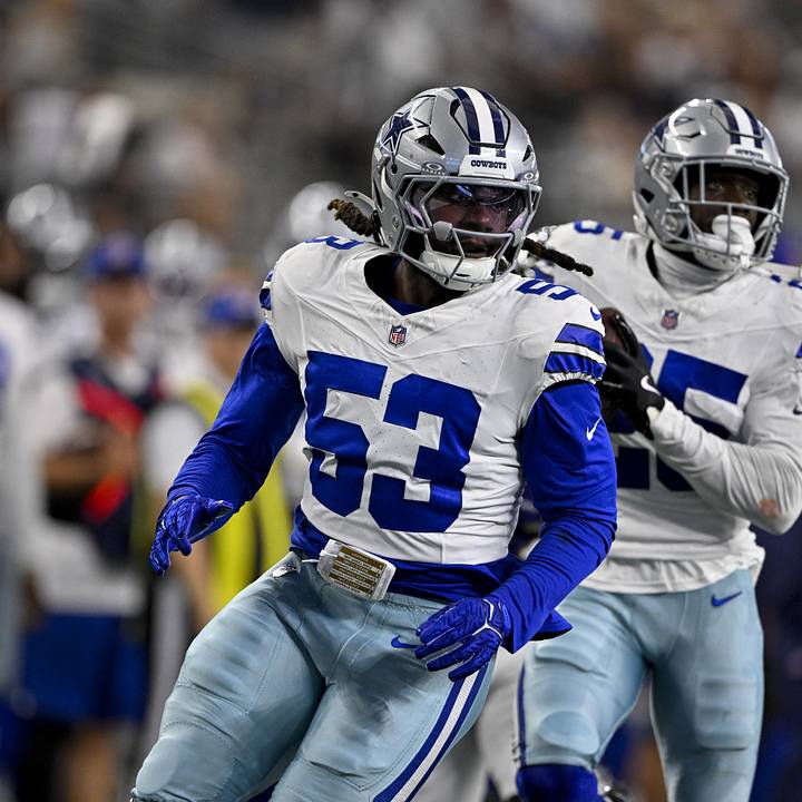 Dallas Cowboys linebacker James Houston celebrates an interception return for a touchdown against the Baltimore Ravens 