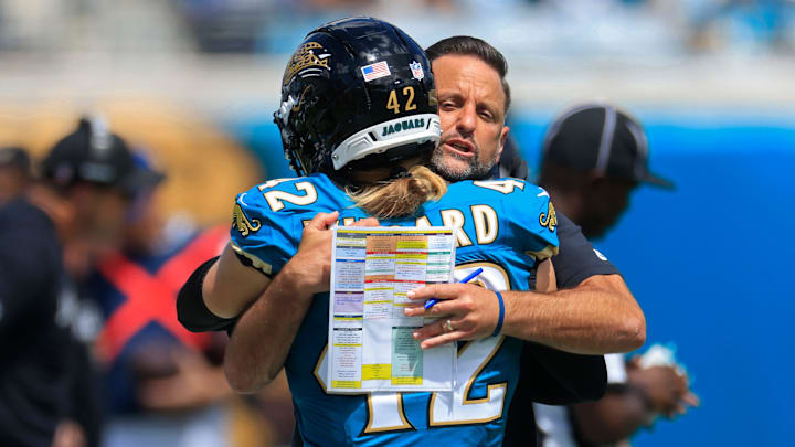 Jacksonville Jaguars defensive coordinator Anthony Campanile hugs safety Andrew Wingard (42) before an NFL football matchup at EverBank Stadium, Sunday, Sept. 21, 2025, in Jacksonville, Fla. The Jaguars defeated the Texans 17-10. Jacksonville Jaguars defensive coordinator Anthony Campanile hugs safety Andrew Wingard (42) before an NFL football matchup at EverBank Stadium, Sunday, Sept. 21, 2025, in Jacksonville, Fla. The Jaguars defeated the Texans 17-10.