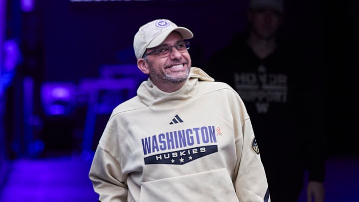 Washington Huskies head coach Jedd Fisch smiles as he enters Husky Stadium before his team's Week 12 win over Purdue. Washington Huskies head coach Jedd Fisch smiles as he enters Husky Stadium before his team's Week 12 win over Purdue.