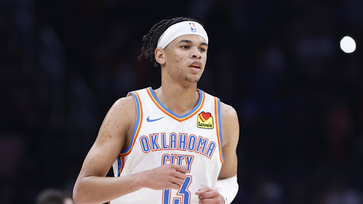 Jan 11, 2024; Oklahoma City, Oklahoma, USA; Oklahoma City Thunder forward Ousmane Dieng (13) runs down the court between plays against the Portland Trail Blazers during the second half at Paycom Center. Mandatory Credit: Alonzo Adams-Imagn Images
