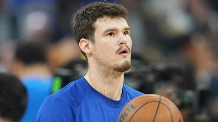 Jan 2, 2026; San Francisco, California, USA; Golden State Warriors center Quinten Post (21) before the game against the Oklahoma City Thunder at Chase Center. Mandatory Credit: Darren Yamashita-Imagn Images Jan 2, 2026; San Francisco, California, USA; Golden State Warriors center Quinten Post (21) before the game against the Oklahoma City Thunder at Chase Center. Mandatory Credit: Darren Yamashita-Imagn Images