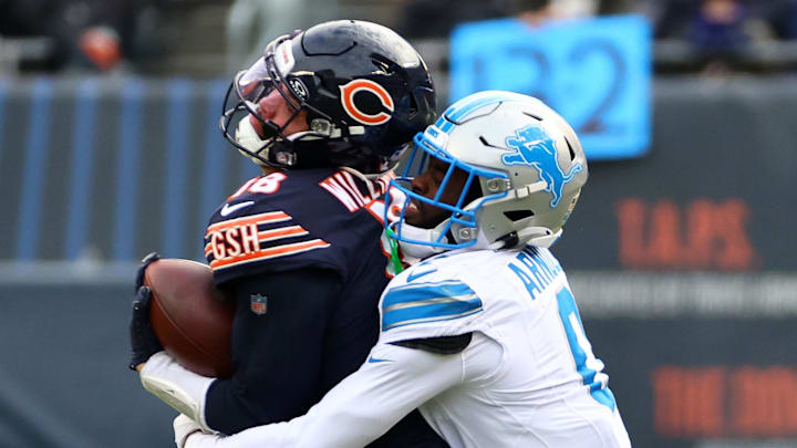 Chicago Bears quarterback Caleb Williams (18) is hit by Detroit Lions cornerback Terrion Arnold (0) during the second half Chicago Bears quarterback Caleb Williams (18) is hit by Detroit Lions cornerback Terrion Arnold (0) during the second half