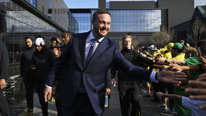 Oct 26, 2024; Eugene, Oregon, USA; Oregon Ducks head coach Dan Lanning greets fans before a game against the Illinois Fighting Illini at Autzen Stadium. Mandatory Credit: Troy Wayrynen-Imagn Images