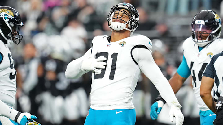 Dec 22, 2024; Paradise, Nevada, USA; Jacksonville Jaguars defensive end Arik Armstead (91) celebrates after sacking Las Vegas Raiders quarterback Aidan O'Connell (12) during the first quarter at Allegiant Stadium. Mandatory Credit: Stephen R. Sylvanie-Imagn Images