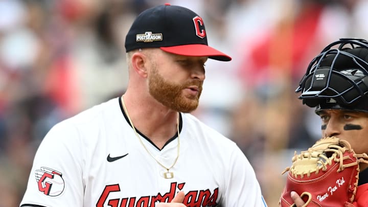 Oct 12, 2024; Cleveland, Ohio, USA; Cleveland Guardians pitcher Andrew Walters (63) and catcher Bo Naylor (23) talk on the mound in the fifth inning against the Detroit Tigers during game five of the ALDS for the 2024 MLB Playoffs at Progressive Field. Mandatory Credit: Ken Blaze-Imagn Images