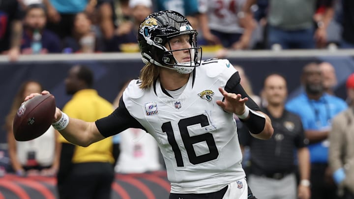 Sep 29, 2024; Houston, Texas, USA; Jacksonville Jaguars quarterback Trevor Lawrence (16) passes against the Jacksonville Jaguars in the second half at NRG Stadium. Mandatory Credit: Thomas Shea-Imagn Images