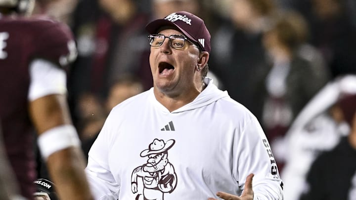 Nov 30, 2024; College Station, Texas, USA; Texas A&M Aggies head coach Mike Elko reacts during the second half against the Texas Longhorns. The Longhorns defeated the Aggies 17-7. at Kyle Field. Mandatory Credit: Maria Lysaker-Imagn Images 