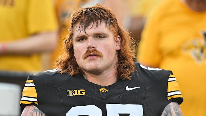 Sep 13, 2025; Iowa City, Iowa, USA; Iowa Hawkeyes offensive lineman Gennings Dunker (67) looks on before the game against the Massachusetts Minutemen at Kinnick Stadium. Sep 13, 2025; Iowa City, Iowa, USA; Iowa Hawkeyes offensive lineman Gennings Dunker (67) looks on before the game against the Massachusetts Minutemen at Kinnick Stadium.