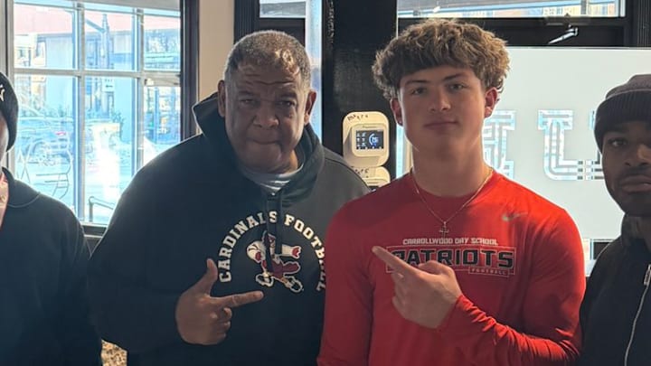 Louisville recruiting director Vince Marrow and Tampa (Fla.) Carrollwood Day athlete Brooklyn Maxey