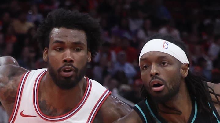 Portland Trail Blazers forward Jerami Grant drives to the basket against Houston Rockets forward Tari Eason.