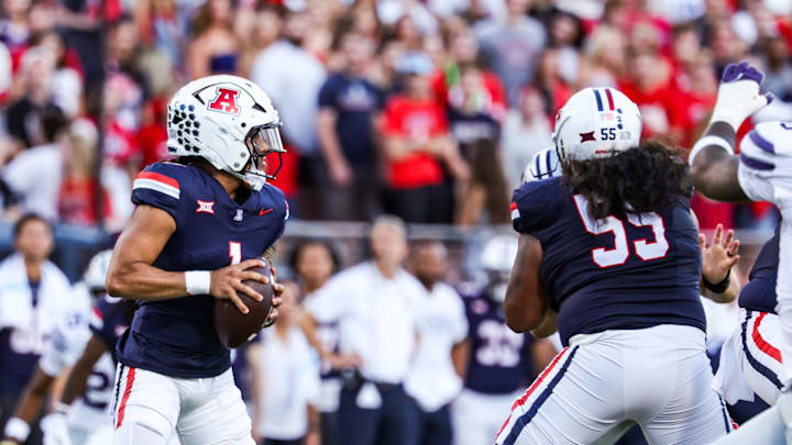 Sep 12, 2025; Tucson, Arizona, USA; Arizona Wildcats quarterback Noah Fifita (1) looks to pass the ball during the first quarter of the game against the Kansas State Wildcats at Arizona Stadium. Mandatory Credit: Aryanna Frank-Imagn Images Sep 12, 2025; Tucson, Arizona, USA; Arizona Wildcats quarterback Noah Fifita (1) looks to pass the ball during the first quarter of the game against the Kansas State Wildcats at Arizona Stadium. Mandatory Credit: Aryanna Frank-Imagn Images