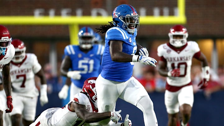 Ole Miss Rebels tight end Dae'Quan Wright (8) runs after a catch as Arkansas Razorback defensive back Miguel Mitchell (16) attempt to make the tackle during the second quarter at Vaught-Hemingway Stadium. Ole Miss Rebels tight end Dae'Quan Wright (8) runs after a catch as Arkansas Razorback defensive back Miguel Mitchell (16) attempt to make the tackle during the second quarter at Vaught-Hemingway Stadium.
