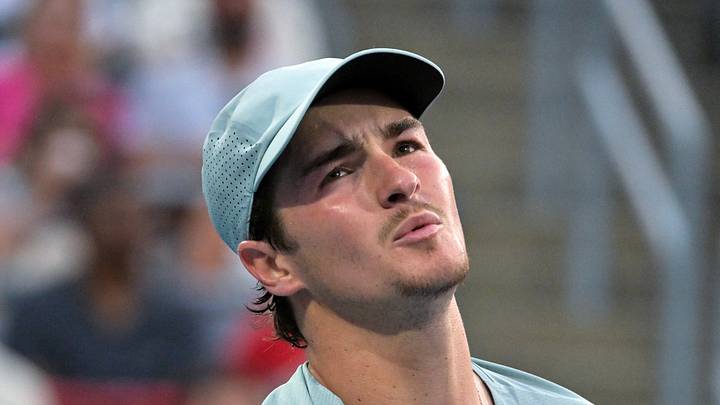 Joao Fonseca reacts after losing a point