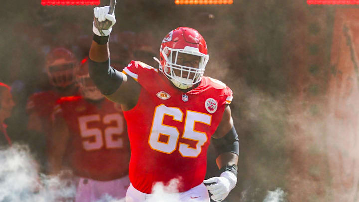 Sep 24, 2023; Kansas City, Missouri, USA; Kansas City Chiefs guard Trey Smith (65) takes the field prior to a game against the Chicago Bears at GEHA Field at Arrowhead Stadium. Mandatory Credit: Jay Biggerstaff-Imagn Images