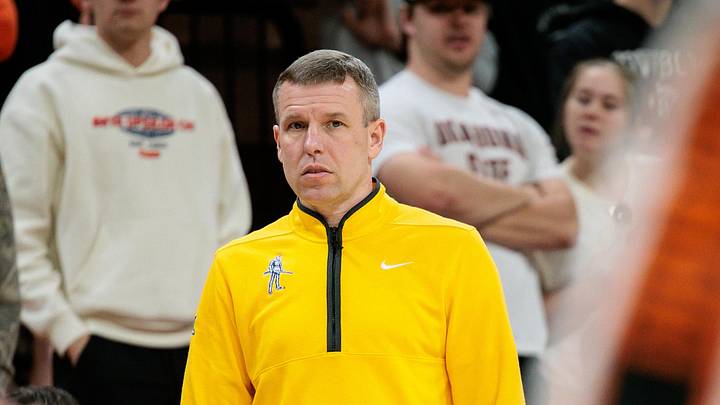 Feb 24, 2026; Stillwater, Oklahoma, USA; West Virginia Mountaineers coach Ross Hodge watches game play during the first half against the Oklahoma State Cowboys at Gallagher-Iba Arena. Mandatory Credit: William Purnell-Imagn Images