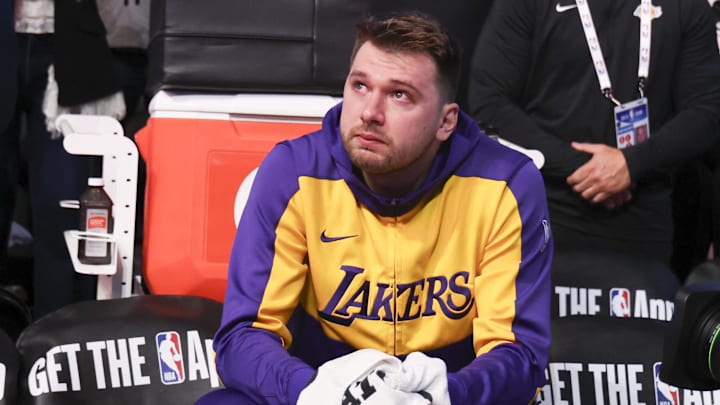 Apr 9, 2025; Dallas, Texas, USA;  Los Angeles Lakers guard Luka Doncic (77) reacts while watching a tribute video before the game against the Dallas Mavericks at American Airlines Center. Mandatory Credit: Kevin Jairaj-Imagn Images