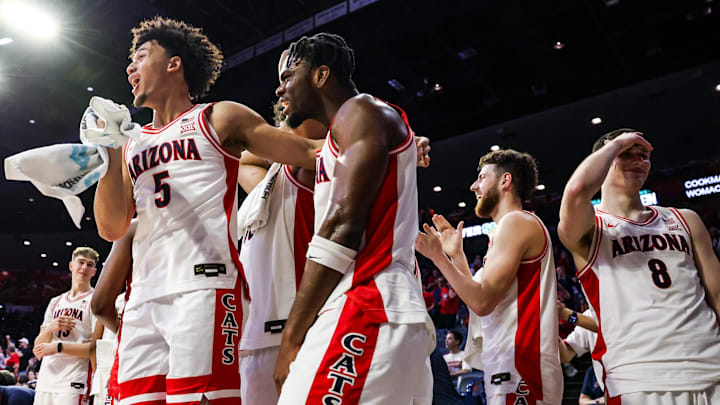 Dec 22, 2025; Tucson, Arizona, USA; Arizona Wildcats guard Brayden Burries (5) and teammates celebrate at the bench during the second half of the game against the Bethune-Cookman Wildcats at McKale Memorial Center. Mandatory Credit: Aryanna Frank-Imagn Images