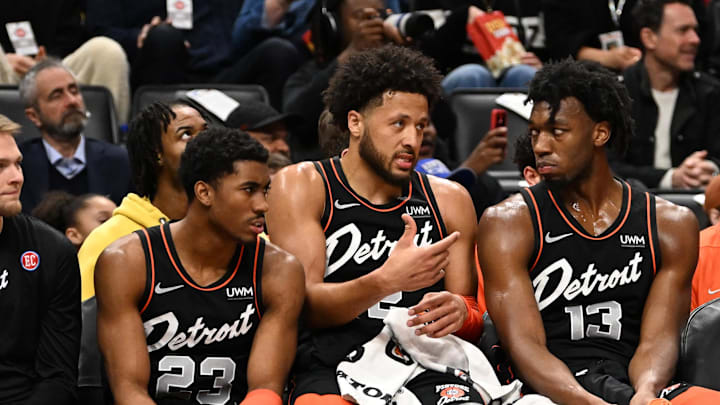 Mar 22, 2024; Detroit, Michigan, USA; Detroit Pistons guard Cade Cunningham (2) (center) talks with guard Jaden Ivey (23) (left) and center James Wiseman (13) on the bench in the first quarter of their game against the Boston Celtics at Little Caesars Arena. Mandatory Credit: Lon Horwedel-Imagn Images Mar 22, 2024; Detroit, Michigan, USA; Detroit Pistons guard Cade Cunningham (2) (center) talks with guard Jaden Ivey (23) (left) and center James Wiseman (13) on the bench in the first quarter of their game against the Boston Celtics at Little Caesars Arena. Mandatory Credit: Lon Horwedel-Imagn Images