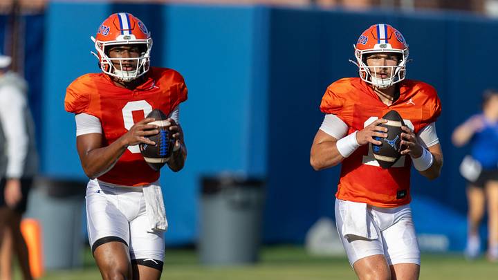 Florida quarterbacks Tramell Jones Jr. (9) and Aaron Philo (12) throw during Florida Football Fall camp practice availability at Heavener Football Training Center. Florida quarterbacks Tramell Jones Jr. (9) and Aaron Philo (12) throw during Florida Football Fall camp practice availability at Heavener Football Training Center.