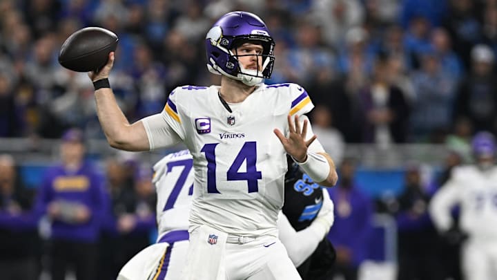 Jan 5, 2025; Detroit, Michigan, USA; Minnesota Vikings quarterback Sam Darnold (14) throws the ball against the Detroit Lions in the first quarter at Ford Field. Mandatory Credit: Lon Horwedel-Imagn Images