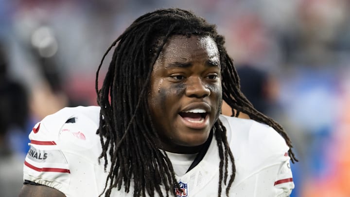 Dec 15, 2024; Glendale, Arizona, USA; Arizona Cardinals running back DeeJay Dallas (20) against the New England Patriots at State Farm Stadium. Mandatory Credit: Mark J. Rebilas-Imagn Images