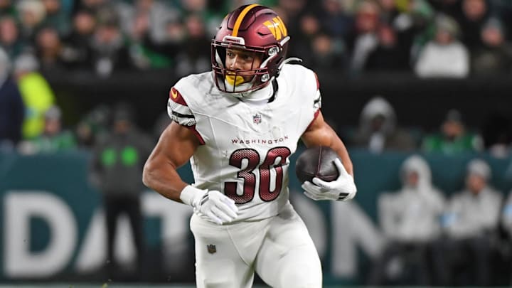 Nov 14, 2024; Philadelphia, Pennsylvania, USA; Washington Commanders running back Austin Ekeler (30) against the Philadelphia Eagles at Lincoln Financial Field. Mandatory Credit: Eric Hartline-Imagn Images